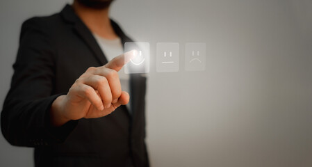 customer evaluation concept, business check smile face on screen evaluation for the service and giving opinion for best quality of service the he got