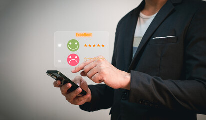 customer evaluation and survey, businessman using phone tick on smile face because he is satisfied with excellent service and performance