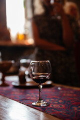 A glass of wine at a tasting in Armenia. Stands on the table
