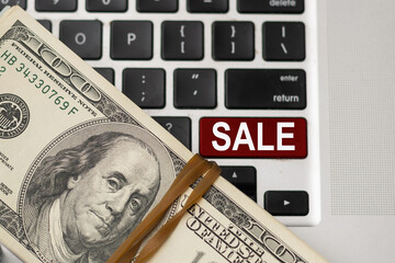 sell written on keyboard showing business or finance concept
