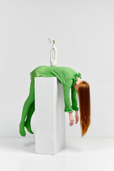 Avant-garde and experimental art style of human portrait. Beautiful woman with long glossy healthy...