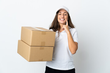 Young delivery woman over isolated white background smiling with a happy and pleasant expression