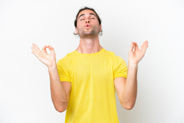 Caucasian handsome man isolated on white background in zen pose