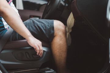 Lever handle for car seat height and low height adjustable.Hand holding on lever for Adjustable car...