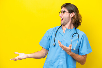 Young surgeon caucasian man isolated on yellow background with surprise facial expression