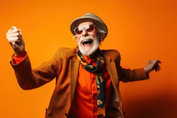 Eccentric elderly senior man dancing happily and carefree in front of a vibrant background, expressing joy and free spirit, beauty of aging and individuality, generative ai