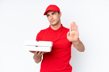 Pizza delivery caucasian man with work uniform picking up pizza boxes isolated on white background...