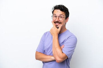 Fototapeta premium Young man with moustache isolated on white background happy and smiling
