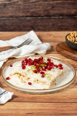 Gullac dessert. Milky dessert made special for the month of Ramadan. Traditional Turkish cuisine delicacies. gullac dessert on plate