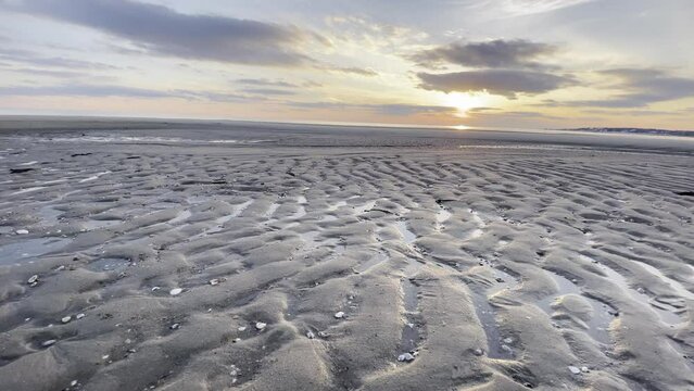 Ocean Trickles In Over the Low Tide Flats at Sunset at Chatham, Cape Cod