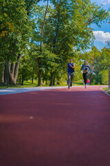 Young couple running