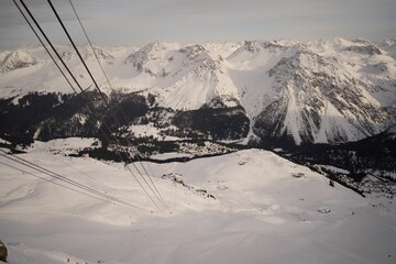 Landscape of snow resort skiing with white snowy mountains range