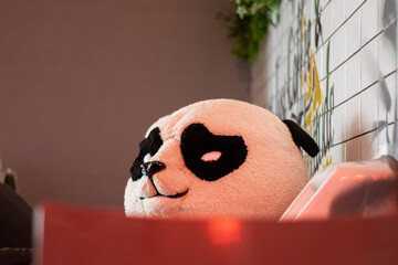 A panda plush toy in the cafe © erkansivas