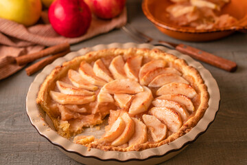 Homemade apple tart on wooden table. Fresh Baked Apple Pie