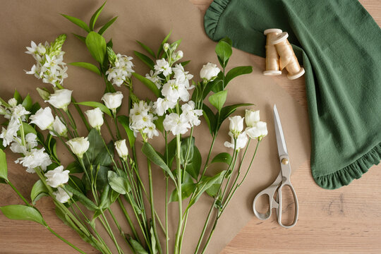 Various white flowers on craft paper