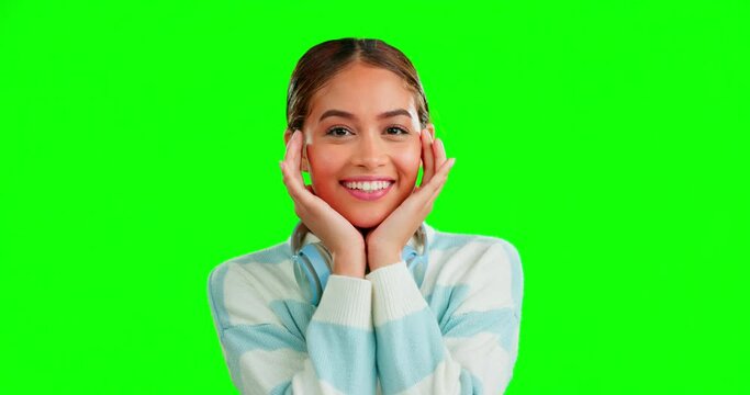 Woman, happy and shock face by green screen studio background with funny moment, wow and open mouth. Surprise gen z girl, young model and hands in comic portrait for mock up space with cheerful smile