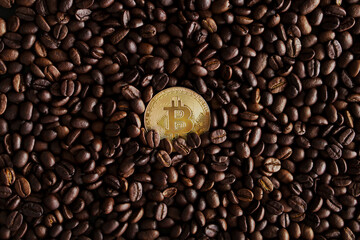 bitcoin on coffee beans background