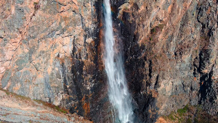 Beautiful high waterfall rocks mountain scenic background nature