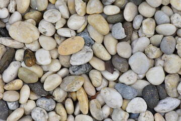 Close-up round and oval multicolored river stones