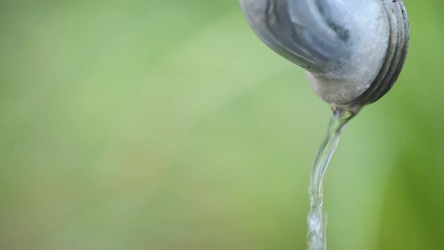 Garden water faucet dripping