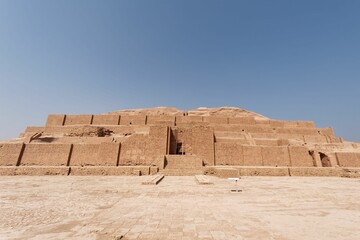 Fototapeta na wymiar Beautiful shot of the historic Ziggurat of Chogha Zanbil under a blue sky in Khuzestan, Iran