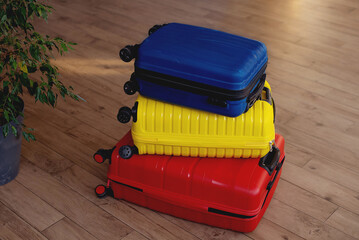suitcases packed for summer journey in room. travel concept