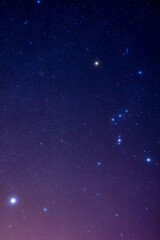 Orion constellation and Sirius, brightest observable star from Earth, photographed with wide angle lens.