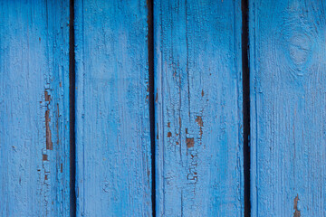 retro blue wooden background with cracked paint