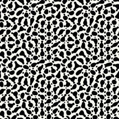 Vector seamless pattern. Abstract spotty texture. Natural monochrome design. Creative background with rounded spots. Decorative organic swatch.