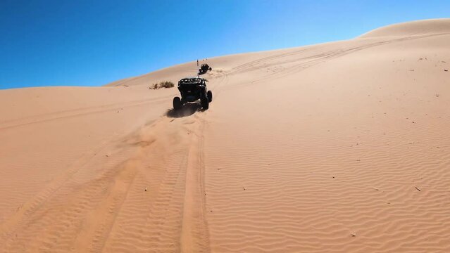 Canam UTV Side by Side driving in the Sand Dunes