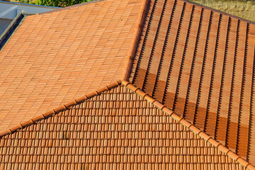 Fototapeta na wymiar Roof covered with terracotta tiles