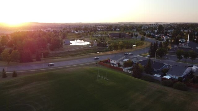 Aerial sunset view of small Albertan town in the summer. 