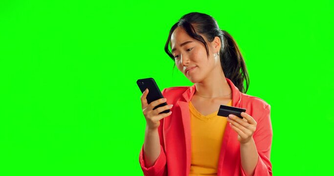 credit card problem, phone and woman isolated on studio background or green screen for debt, financial fail or decline. Sad, depression and unhappy face of asian person on cellphone with fintech app
