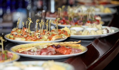 Bar counter with appetizers for a buffet table