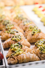 Italian Bakery counter, traditional Sicilian pastry with pistachio. Fresh and tasty products