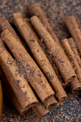 solid aromatic cinnamon on the table in chocolate