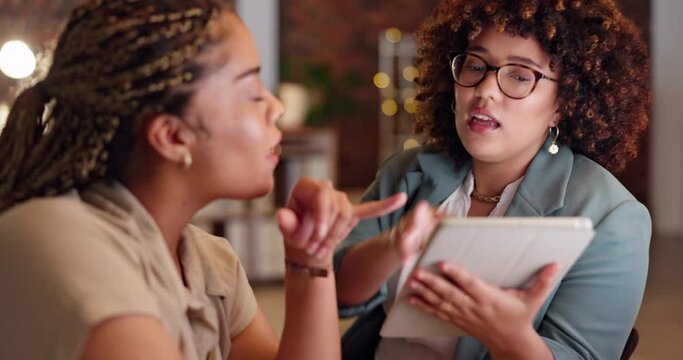 Tablet, meeting and collaboration with a business woman team in the office at night for strategy or planning. Teamwork, talking or discussion with a female employee and partner at work together