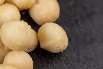 Peeled macadamia nuts on the table