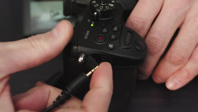 Connecting shutter release cable to mirrorless camera