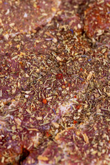 Pork meat pieces marinated with spices and salt