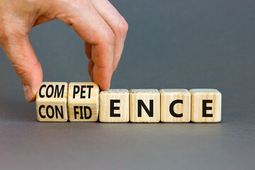 Competence and confidence symbol. Concept word Competence Confidence on wooden cubes. Businessman...