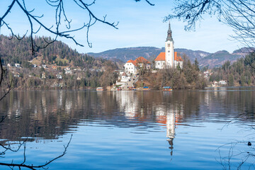 Bled lake, Slovenia. Church of the Mother of God, located on a small island in the middle of Bled Lake. Pilgrimage Church of the Assumption of Mary, Our Lady of the Lake.