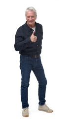 Fototapeta premium front view of a full length portrait of a man thumbs up on white background
