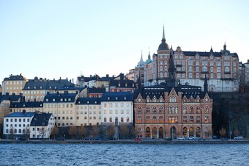 Fototapeta premium Stockholm waterfront view towards Sodermalm district with historic Mariahissen building and Monteliusvagen, Sweden, Scandinavia 