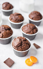 Fresh chocolate carrot muffins with drink
