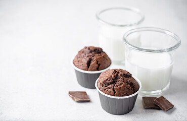 Fresh chocolate carrot muffins with drink
