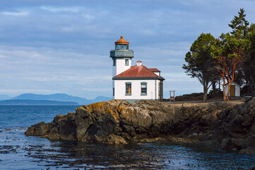 Fototapeta na wymiar Lighthouse in the San Juanas off of the coast of Washington State