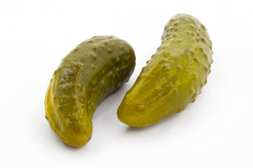 Pickled cucumbers on a white background isolated with shadow