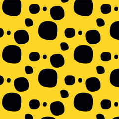 Abstract spots black on a yellow background. leopard skin texture