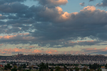 Fototapeta na wymiar View of the cloudy sky over the city